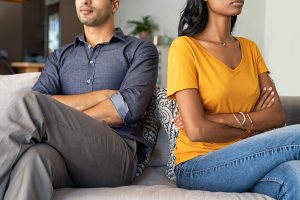 A couple sit facing away from one another with arms crossed. This could represent a relationship issue that couples therapy in Greenwood Village, CO can address. Learn more about relationship counseling in Englewood, CO or couples therapy in Littleton, CO today. 